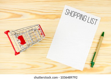 Shopping List Mockup, Shopping Cart, Pen, On Wooden Background Composition. Shopping Concept