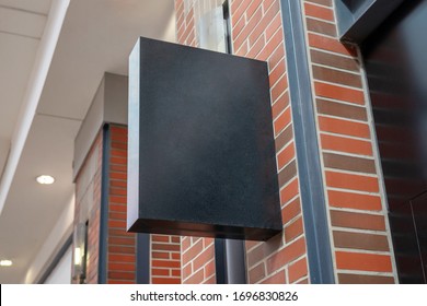 Shopping mall store signage mockup. Rectangular vertical shape, black color