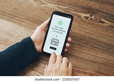 Shopping online. Ordering product online using smartphone. Female hands using smartphone for online shopping. Order confirmation - thank you. Your order has been placed successfully - displayed in app - Shutterstock ID 2150537657