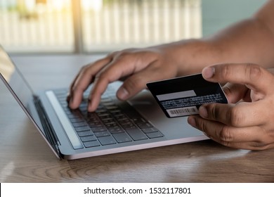 Shopping And Online Payment Credit Card Purchase Online Businessman Mobile Payment  On Table