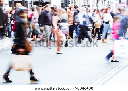 shopping people walking on the pedestrian crossing