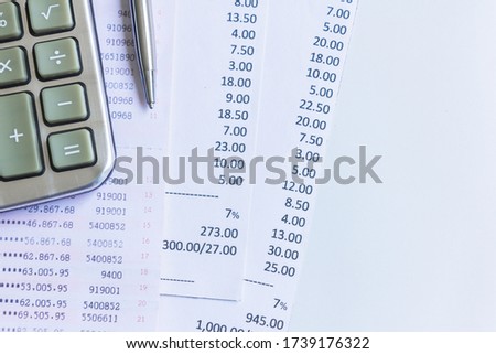 shopping receipts and calculator with save money concept