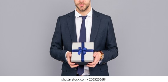 Shopping Sale And Discount. Business Man Hold Gift. Boxing Day. Cropped Businessman