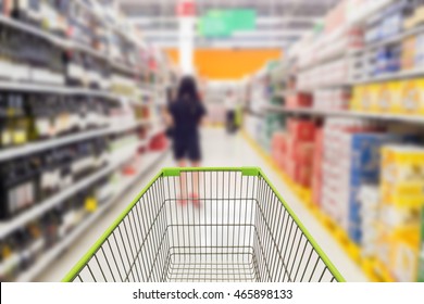 Shopping in supermarket shopping cart view - Shutterstock ID 465898133