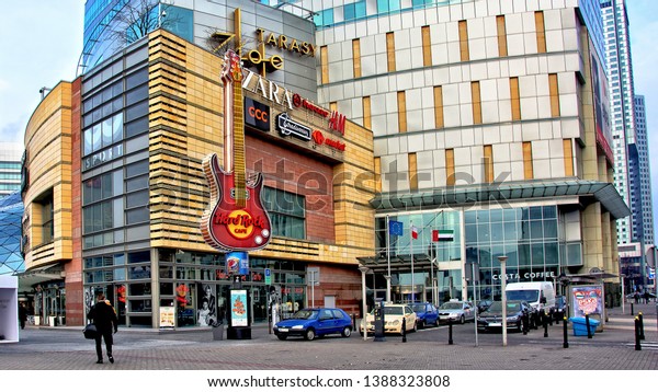 Shopping in Warsaw. Urban landscape.\
Modern architecture. Hard Rock Cafe. Zara. H&M. Shopping Mall\
Golden Terraces. Warsaw, Poland – February 14,\
2016