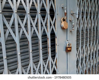  Shops Closing Down With Shutters Closed. Shops Locked In Bengaluru India . Lockdown Again Due To Pandemic Coronavirus. Second Wave Covid 19  Precautions.