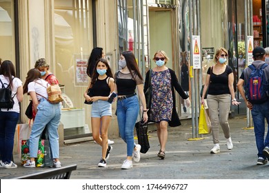 Shops Reopened. Downtown Shopping Street Crowded With People In Masks  Turin, Italy, June 2020.