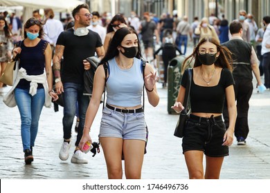 Shops Reopened. Downtown Shopping Street Crowded With People In Masks  Turin, Italy, June 2020.