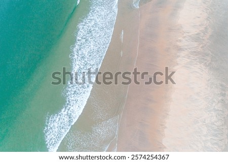 Similar – Image, Stock Photo zenithal aerial view of a beach in summer with bathers, water skates and thatched beach umbrellas for rent, handicapped access ramp and lookout tower seen from above, drone view