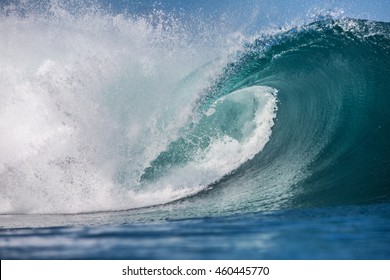 Shorebreak Big Ocean Wave In Daylight. Beautiful Sky With Clouds. Sea Water Surface For Surfing Sport. Nobody On Picture. Vibrant Bright Tropical Rip Curl Colorful Image.