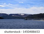 shoreline along the  Bonne Bay;  towards the Tablelands in the Gros Morne National Park along the Viking trail; Newfoundland and Labrador Canada