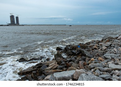 The Shoreline Of The Tarkwa Bay Beach Showing The Eko Atlantic Towers In The Background