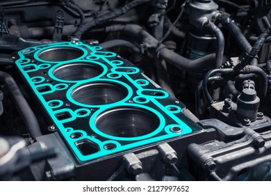 Short block with installed cylinder head gasket. Repair of a turbocharged diesel engine in a car workshop. Close up. Blur effect. - Shutterstock ID 2127997652