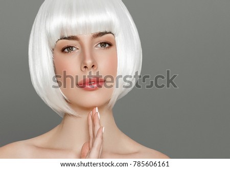 Short blonde hair woman bob platinum hairstyle over gray background