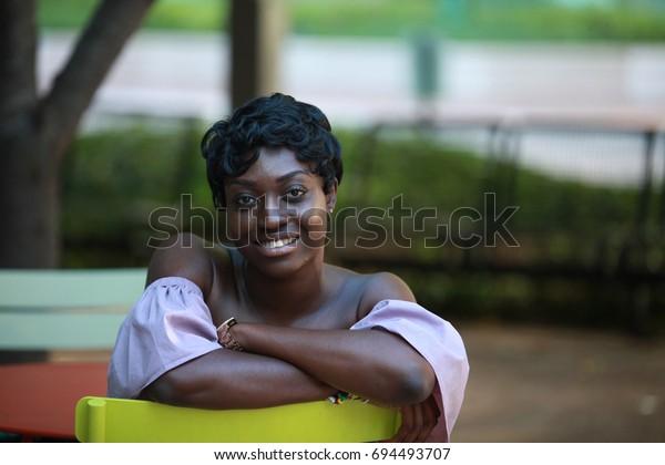 Short Haircut African American Female Happy Stock Photo