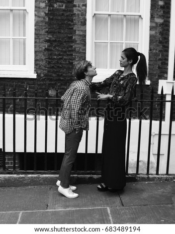 Tall woman kiss