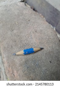 The Short Pencil Sharpened On Both Sides Fell On A Dusty And Dirty Classroom Floor