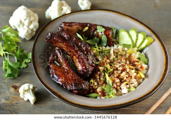 short ribs Asian with cauliflower rice. keto diet recipe. low carbohydrate meal