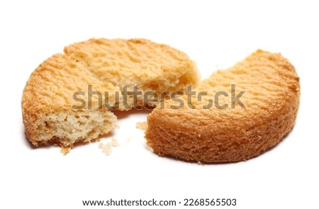 Shortbread biscuit broken, breton style, close up tea pastry with butter isolated on white