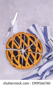 Shortbread pie with jam. Top view. Selective focus.