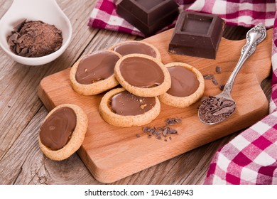 Shortcrust pastry biscuits with chocolate. - Shutterstock ID 1946148943