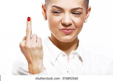 Short-haired girl Fuck you isolated on a white background showing middle finger and smiling. Short hair woman looks at the middle finger and think fuck you.
Woman with short brown haircut wears.