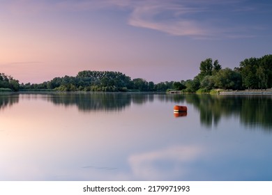 Shortly After Sunset At Giftener See. Red Buoy As Foreground Subject.