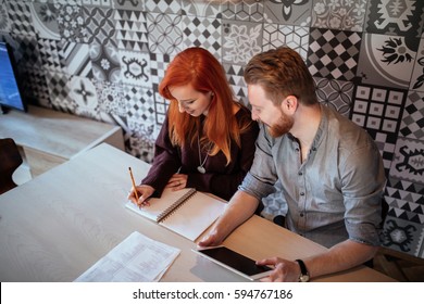 Shot From Above Of Young Couple Managing Financial Future.