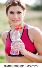 A Shot Of An Active Beautiful Caucasian Woman Outdoor In A Park