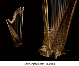 Shot of ancient harp of last century  beginning on the black background. Detail.