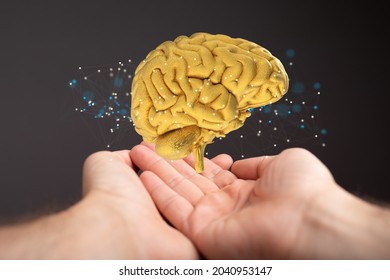 A shot of an artificial brain testing concept with additional effects over human hands