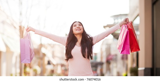 A Shot Of An Asian Woman Shopping Outdoor