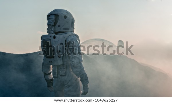 Shot of\
the Astronaut on Red Planet Watching Toward His Base/Research\
Station. Near Future First Manned Mission To Mars, Technological\
Advance Brings Space Exploration,\
Colonization.