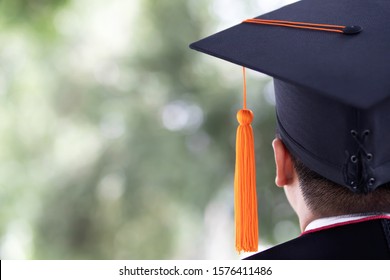 shot of backside young male graduation hats during commencement success, Concept education congratulation the graduate in University outdoors. 