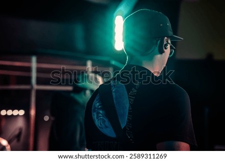 Shot of bass guitarist during performance