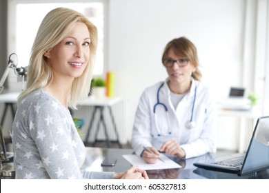 Shot Of A Beautiful Middle Aged Woman Meeting Her Female Doctor In The Hospital.