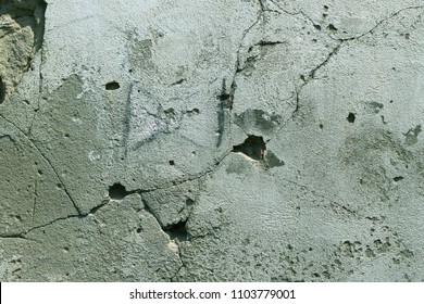 Shot bullets old destroyed building wall. Grunge background. - Shutterstock ID 1103779001