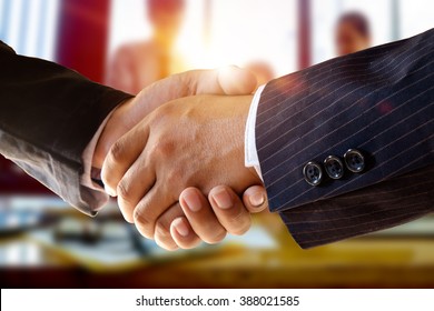 Shot Of Businessmen Handshaking.acquisition Concept.