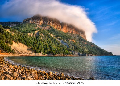 Shot Of Cap Canaille In Cassis Covered By A Hat Shaped Orographic Stratus Cloud