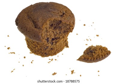 A Shot Of A Chocolate Muffin On White Background.. Including Crumbs