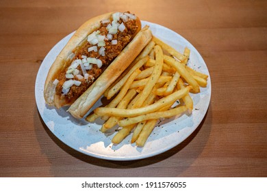 Shot Of Coney Dog And Fries On Plate