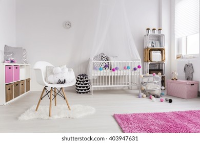 Shot Of A Cosy Nursery Room For A Girl