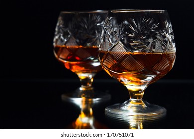 Shot Of A Cut Crystal Glass Containing Brandy. 