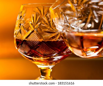 Shot Of A Cut Crystal Glass Containing Brandy. 