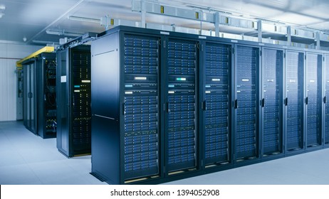 Shot of Data Center With Multiple Rows of Fully Operational Server Racks. Modern Telecommunications, Cloud Computing, Artificial Intelligence, Database, Supercomputer Technology Concept.