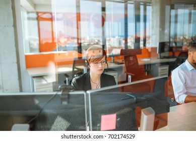 Shot Of A Dispatcher Working In Her Office.