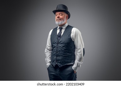 Shot Of Elderly Man Dressed In Stylish Old Fashioned Costume With Top Hat.