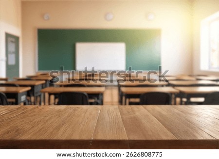 Shot of empty classroom with chairs under desks in elementary school. School during vacation or holidays