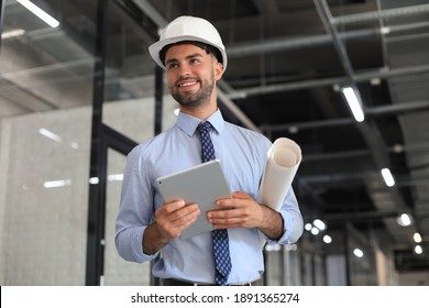 Shot of a engineer using a digital tablet on a construction site