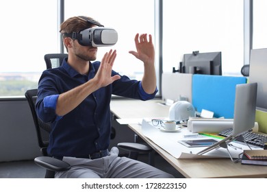 Shot Of An Engineer Wearing A VR Headset In An New Building. Change The Way You See And Experience The World.